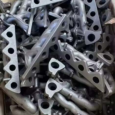 cast iron intake and exhaust manifolds